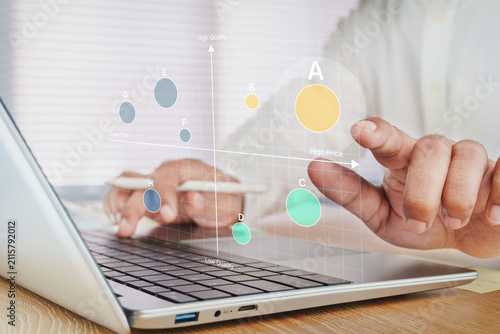 Business professional analyzing market positioning matrix with competitive analysis, product portfolio evaluation, pricing strategy, quality comparison, strategic business decision-making dashboard