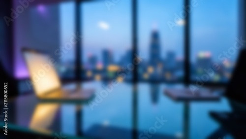 Blurred modern executive office with city skyline view for fintech