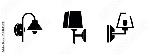 Three black silhouette icons of wall-mounted lights or sconces
