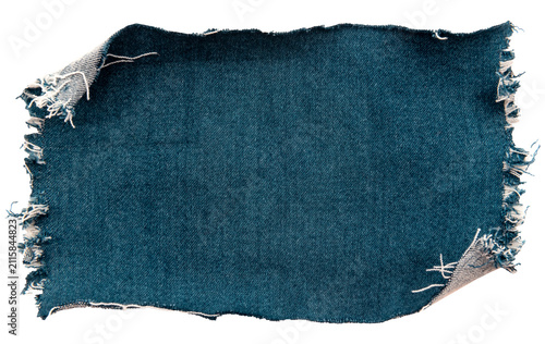 Piece of torn denim on a white background. Denim texture