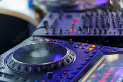 Obraz na płótnie Professional DJ mixing console and media player setup