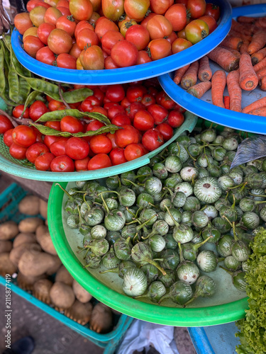 Fresh Vegetables at Traditional Market – Tomatoes, Chilies, Carrots and Eggplants