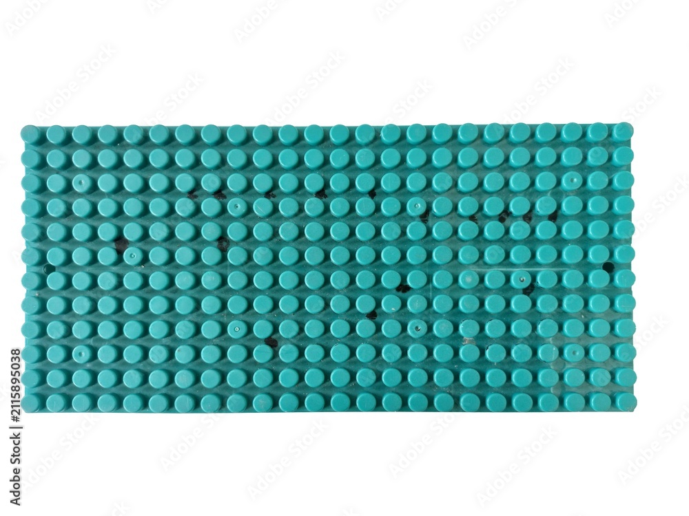 Naklejka premium Green square building plastic bolck board, children's toy isolated on white background 