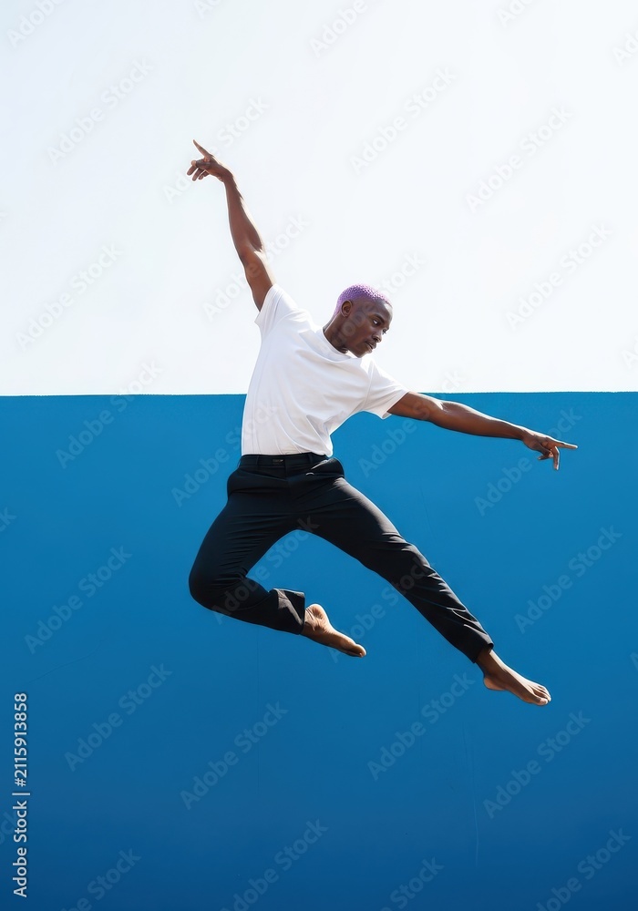 Obraz premium Energetic Young Black Man with Purple Hair Performing Dynamic Contemporary Dance Jump Against Blue and White Background