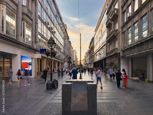 Pedestrians walking along busy Knez Mihailova Street in Belgrade
