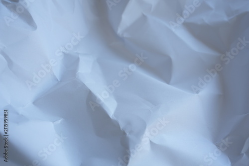 Crumpled White Paper Texture With Folds And Shadows