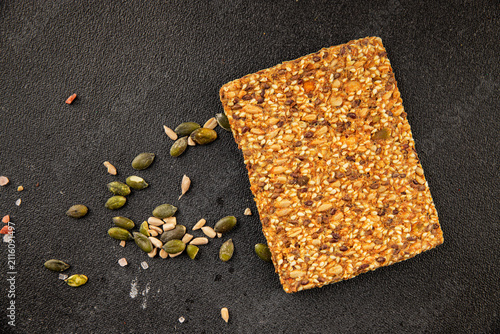 Obraz na płótnie Grain crackers whole-grain cracker sunflower seeds, pumpkin seeds, sesame seeds