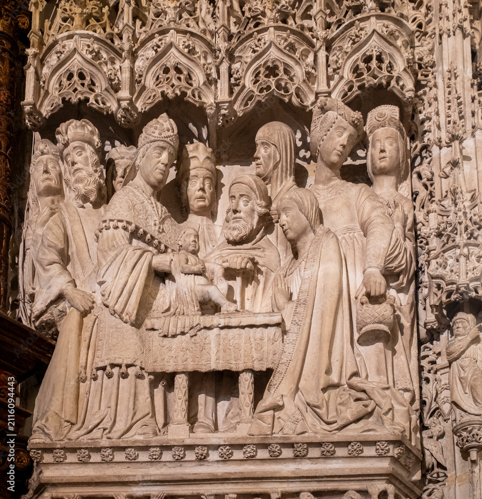 Fototapeta premium Stone relief depicting the Baptism of Christ in Burgos Cathedral, Spain