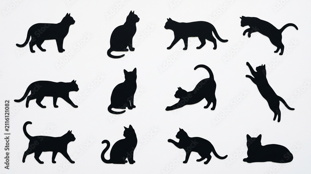 Fototapeta premium Set of black cat silhouettes in various poses including sitting walking jumping and stretching showing different feline body movements for creative design projects and pet graphics