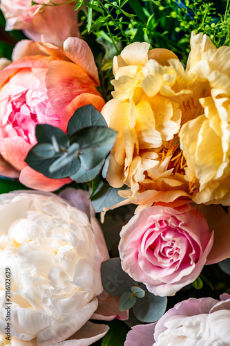 Macro shot of fresh bunch of peonies bouquet of different colors. Card Concept, gentle abstract floral background image, close up, shallow DoF