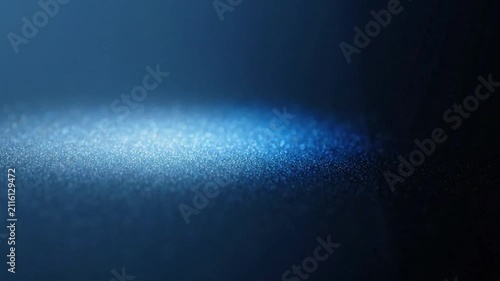 Macro Abstract of Blue Light Beam Moving Over Dark Glittery Textured Surface - Cinematic High-Tech Background