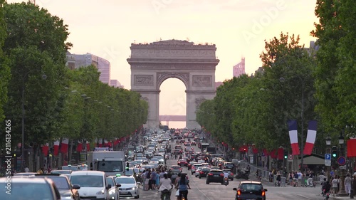 Cinematic footage of the iconic Arc de Triomphe viewed from the Avenue des Champs-Élysées in Paris, France. 4 k video