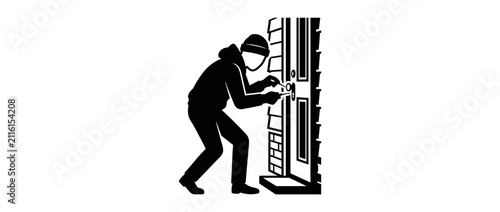 Foto Burglar breaking into a house with tools