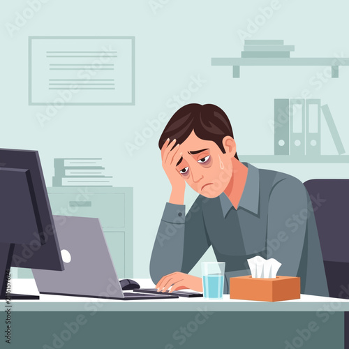 Overwhelmed Businessman Experiencing Stress And Burnout At His Desk