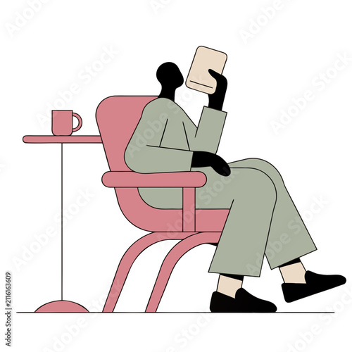 Person relaxing in a chair holding a book with a coffee cup nearby  
