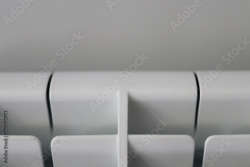 The top of the white aluminum radiator.
