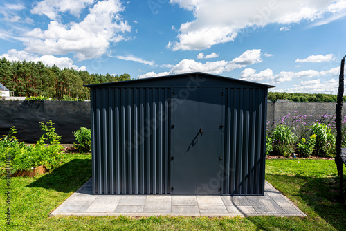 Anthracite modern metal garden shed providing outdoor storage