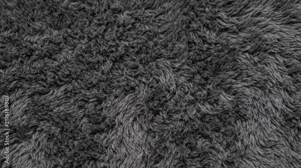 Fototapeta premium Gray textured fluffy fabric background closeup
