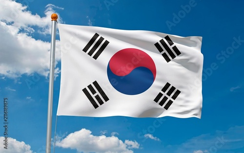 South Korea National Flag Waving on Flagpole Against Blue Sky Taegeukgi Korean Symbol