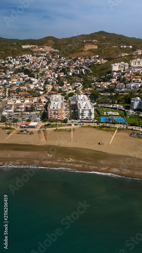 High angle drone view of beachfront buildings along Costa del Sol Spain