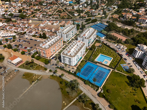 Luxury beachfront residential complex captured from drone above Costa del Sol Spain