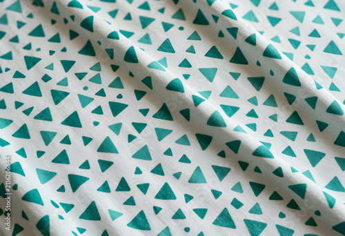 White fabric with teal tria...
