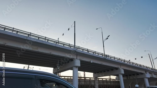 A modern overpass equipped with streetlights during the beautiful time of dusk