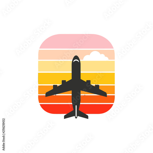 A stylized silhouette of an airplane flying against a vibrant sunset background