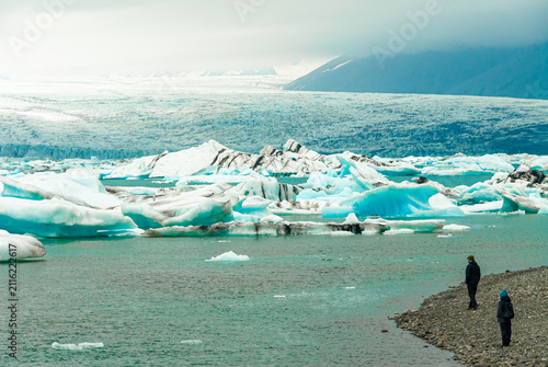 Bild auf Leinwand Floating icebergs in Jökulsárlón Glacier Lagoon Iceland with Vatnajökull glacier