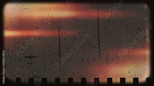 Vintage distressed old photo light leaks, film grain, dust and scratches transparent texture overlay with vignette border. Dirty gritty grunge analog 8k 16:9 retro effect background ...