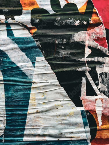 Old grunge ripped, torn vintage posters creased crumpled paper surface texture background