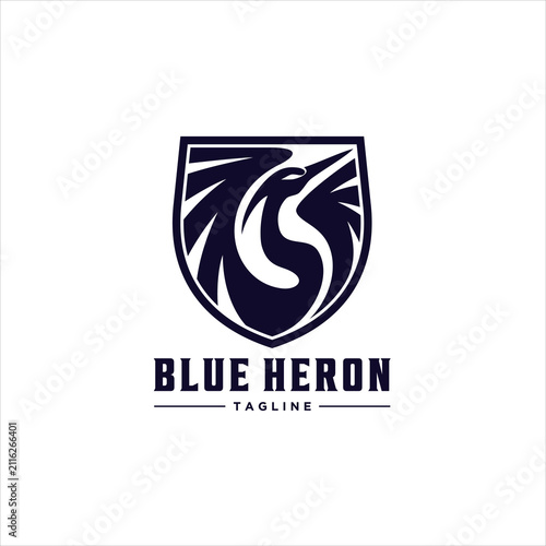 An Emblem or Badge Style Blue Heron Bird Spreading Wings Logo Design Illustration