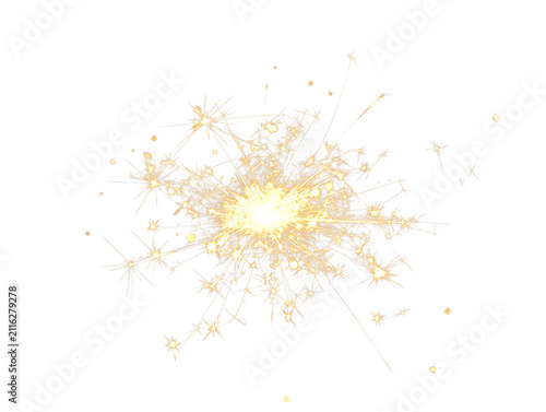 Bright sparkler glowing with a multitude of golden light trails on black background