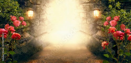 Fantasy dungeon cave with rose flowers and glowing lanterns on walls, lamp illuminate magical trail leading out from old ancient cavern, scene with abandoned ruins, road, mystical glow and tunnel.