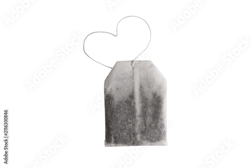 Single tea bag with a heart-shaped string isolated on transparent, symbolizing love and wellness, ideal for food, wellness, and lifestyle themes.