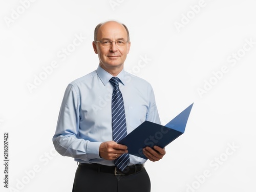 Professional businessman holding a blue folder isolated on white background