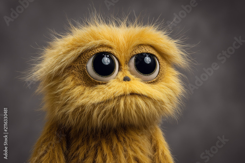 creature of ai, cute yellow furry alien with enormous eyes and long neck, studio portrait, charcoal, photorealistic