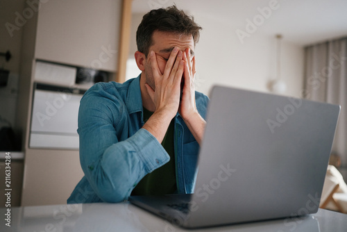 Stressed man working from home