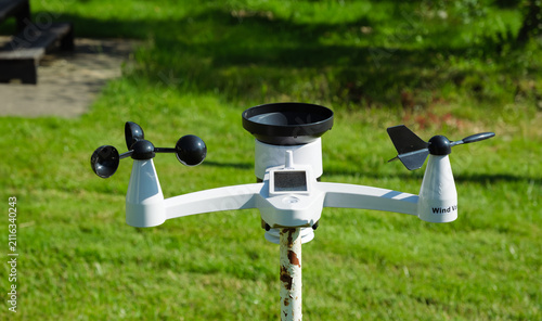 Modern wireless weather station. There are sensors of temperature and humidity, Wind speed and direction, Rain gauge and snow sensors. Solar panel. Meteorological equipment, smart home technology.