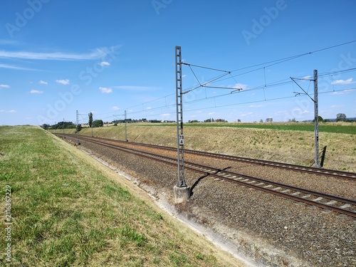 Foto Electrified Railway Tracks Through Open Countryside