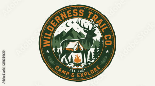 Vintage Wilderness Trail Co. Logo with Deer, Tent, and Mountains.