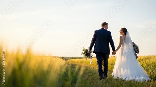 A couple who got married representing wedding celebration love and commitment between two people. the who got married couple wedding marriage bride groom husband wife love romance commitment