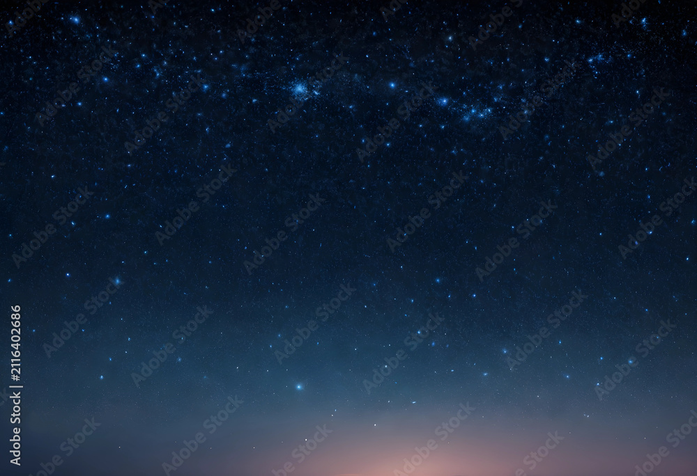 Naklejka premium Dark blue night sky with countless bright stars and a subtle glow on the horizon astronomy and space exploration, a subtle glow appears on the horizon the approach of dawn or distant light pollution