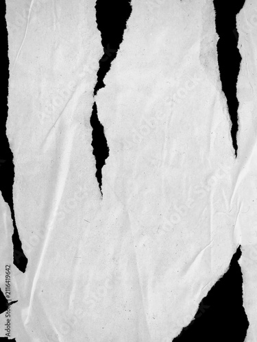 Distressed glued paper texture. Ripped crumpled urban poster background with wheat paste wrinkles and creases. High quality handmade torn paper mockup