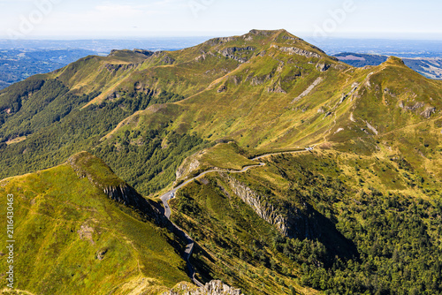Fotografie Hiking across Puy Mary in the Cantal region of Auvergne France reveals spectacular volcanic mountains, panoramic viewpoints, scenic trails in the heart of the Massif Central