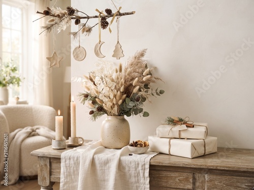 Dried floral arrangement with candles and gifts neutral holiday scene