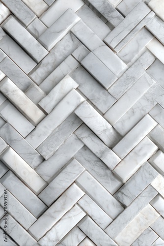 Herringbone pattern of white marble tiles close up full frame architectural detail for luxury interior design and home renovation