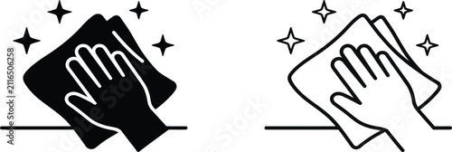 фотографія Hand wiping surface with cloth and sparkles in silhouette style