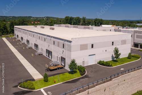 Aerial Drone View of Modern Industrial Warehouse and Distribution Facility