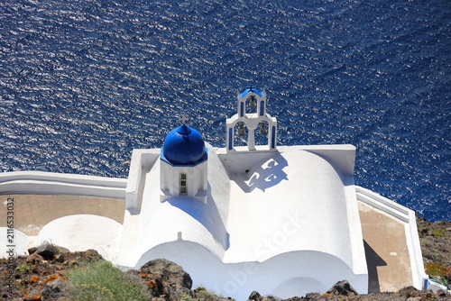 Orthodox Church with its multitiered bell tower facade in Santorini, Greece.
